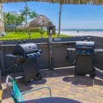 gas grills in tiki hut on beach
