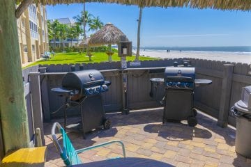 gas grills in tiki hut on beach